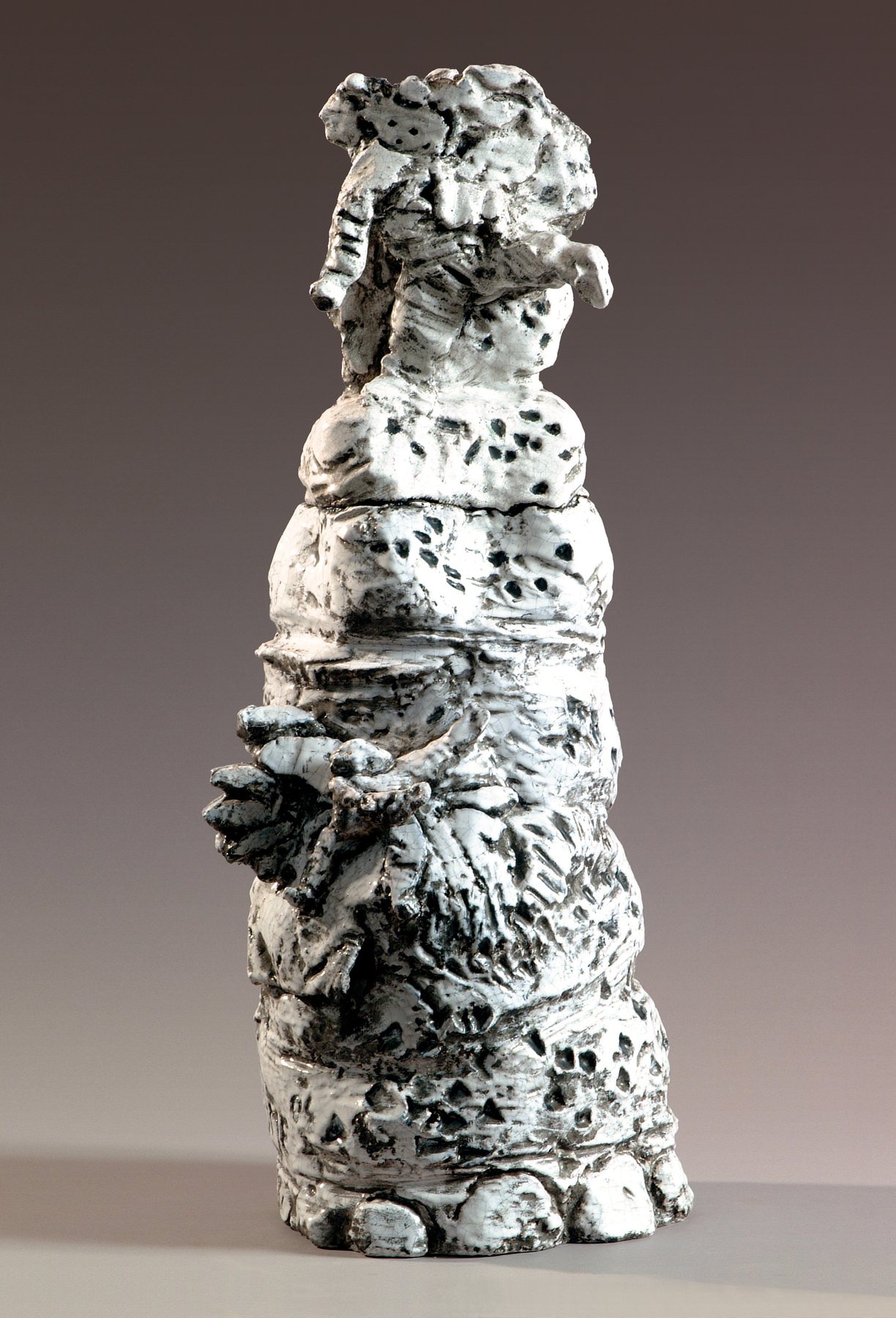 Column of stacked forms in black and white glazed stoneware